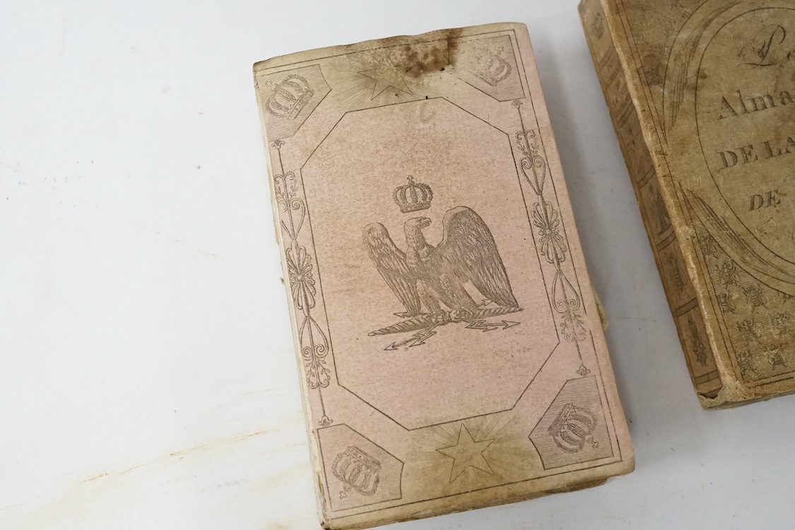 An 1813 Napoleonic Almanack and a reverse glass painted portrait silhouette, 1791, 15cm in diameter. Condition - fair/good